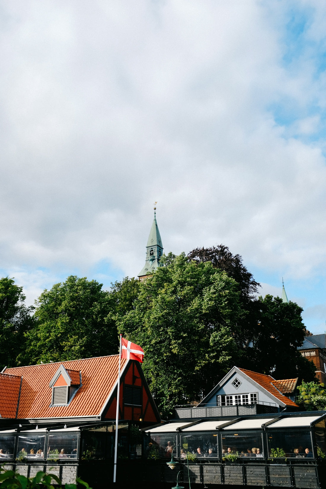 a building with a tower in the background
