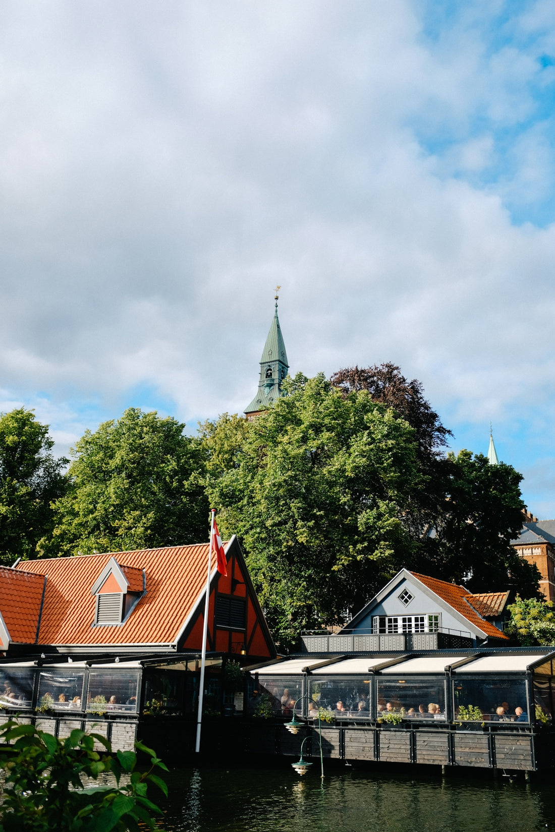 a building with a tower in the background
