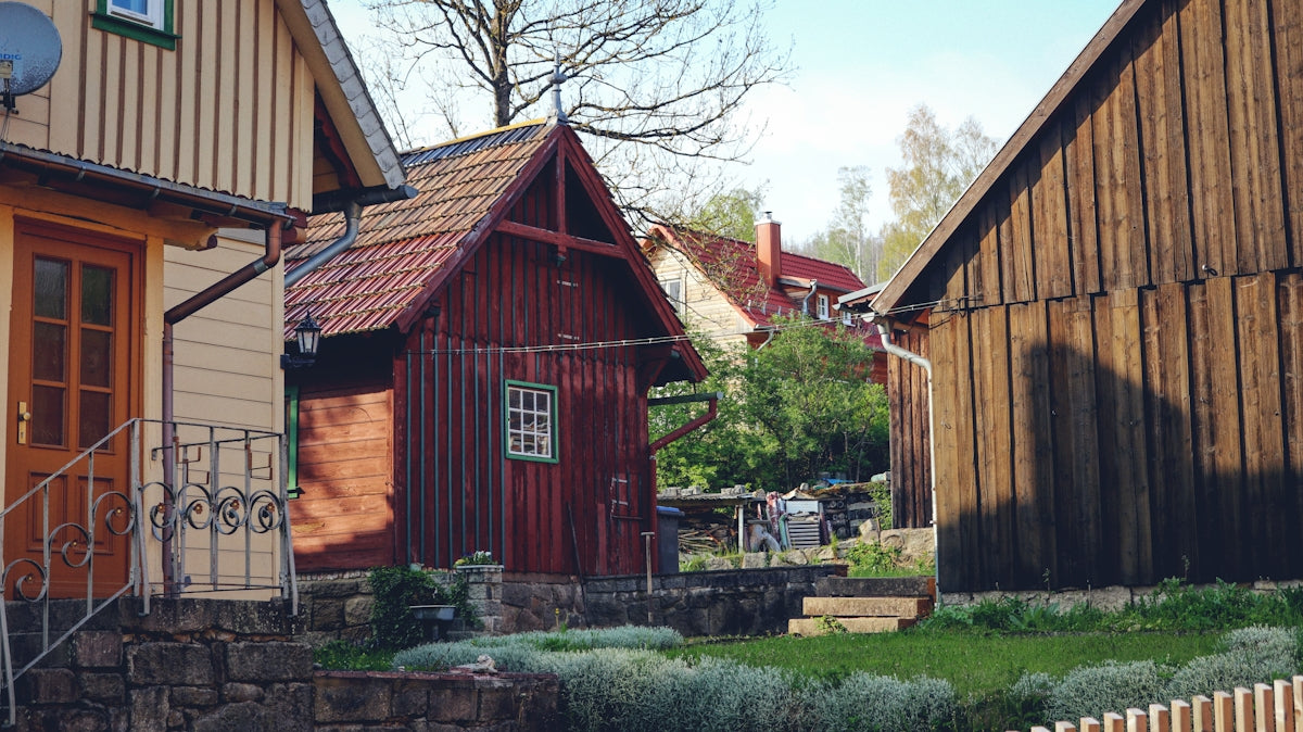 a row of wooden houses next to each other