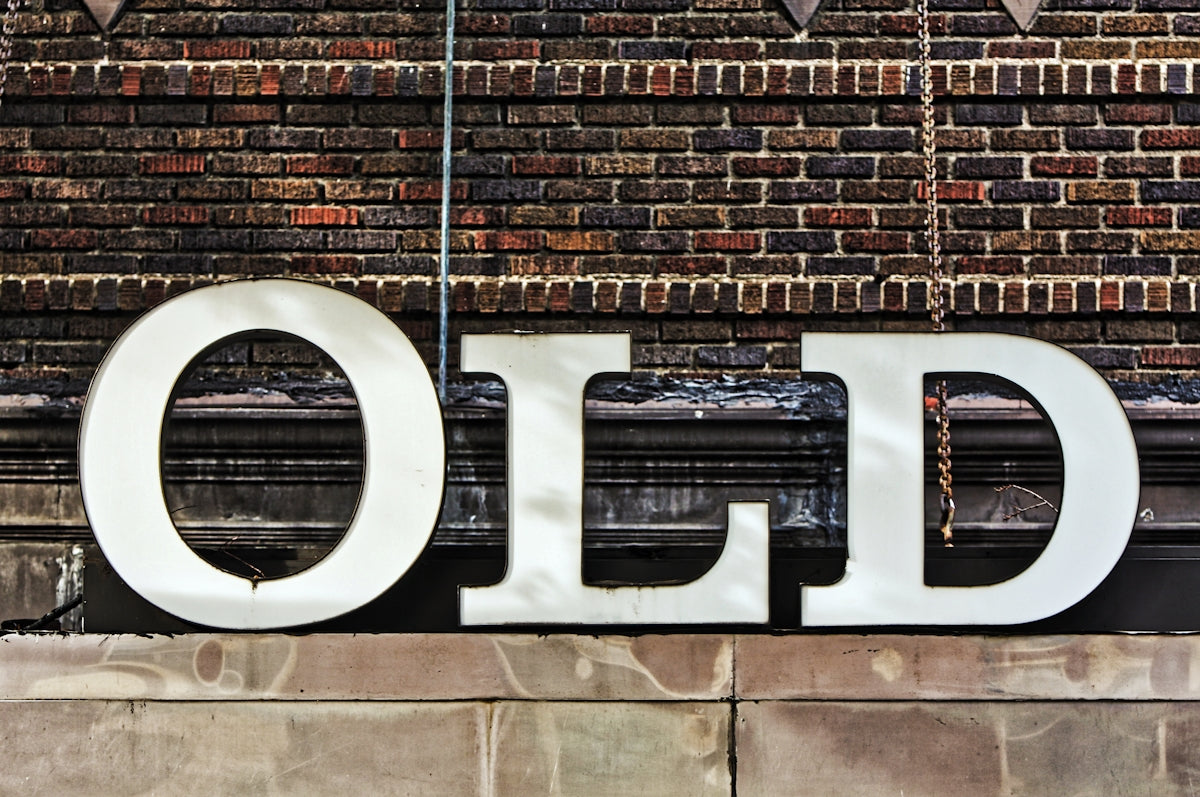 A large sign that is on the side of a building