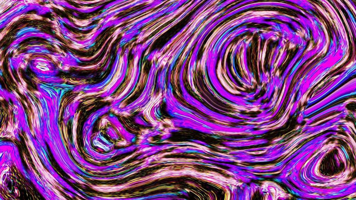 Abstract swirls of purple, pink, and black.