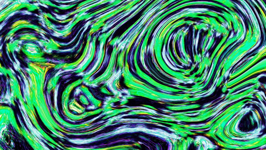 Swirling, colorful abstract pattern with vibrant green.