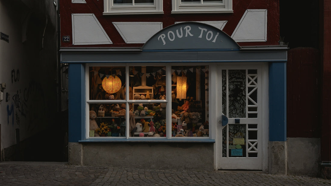 A cozy shopfront with warm lighting.